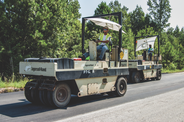Pneumatic-tire rollers are used on the NCAT Test Track to achieve proper compaction and in-place density. Photo courtesy Christine Hall, NCAT, Auburn, Ala.