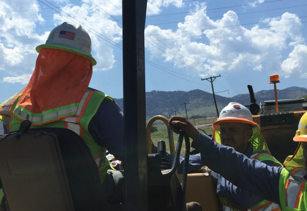 Hardhat brims, like you see here, are very popular with the crew at Martin Marietta Denver Metro Paving Division. Not only does it keep you cooler, but it also prevents sunburn. Photo courtesy of Ray Eisner.