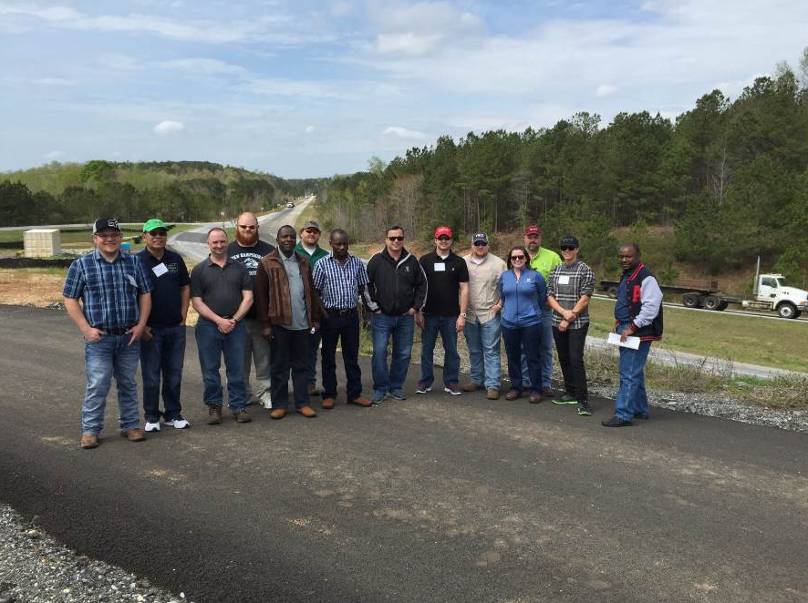 One of the training groups from NCAT shows pride in learning about asphalt. Photo courtesy NCAT.