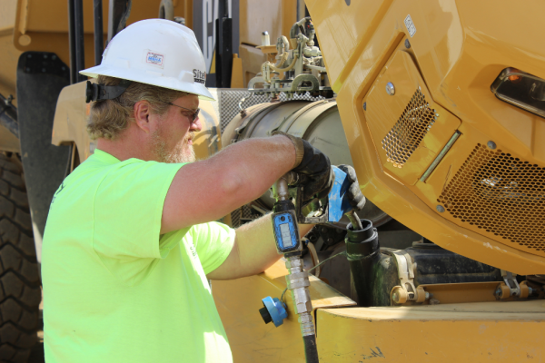 Dispensing DEF from a closed system helps ensure fluid quality and longevity of the SCR system. All photos courtesy of Thunder Creek Equipment.