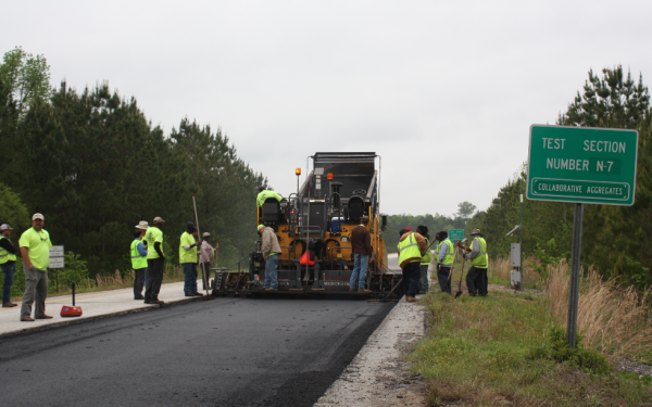 Here we see the crew installing the experimental asphalt pavement for section N7 on the NCAT test track in the summer of 2015. The 1.5-inch surface course included the Delta S rejuvenator.