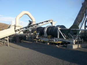The dryer installed at N.B. West includes a knock-out box to allow fines to enter the RAP collar via gravity chute. Photo courtesy Tarmac International.