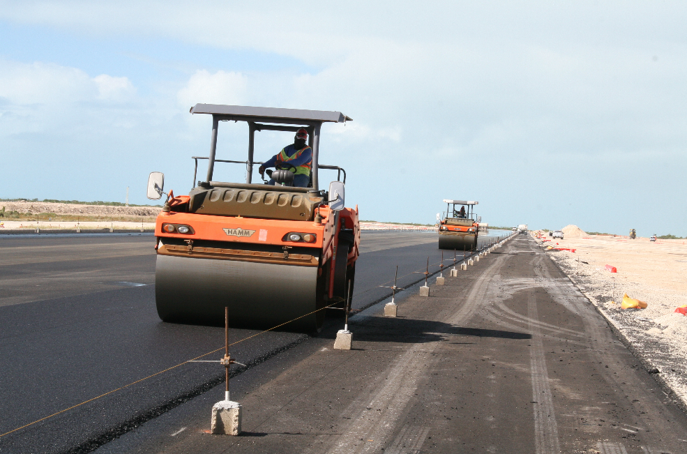 Officials want a total replacement of the runway, taxiways and apron at the South Caicos International Airport. Here the crew puts the finishing touches on the mat with good compaction practices.