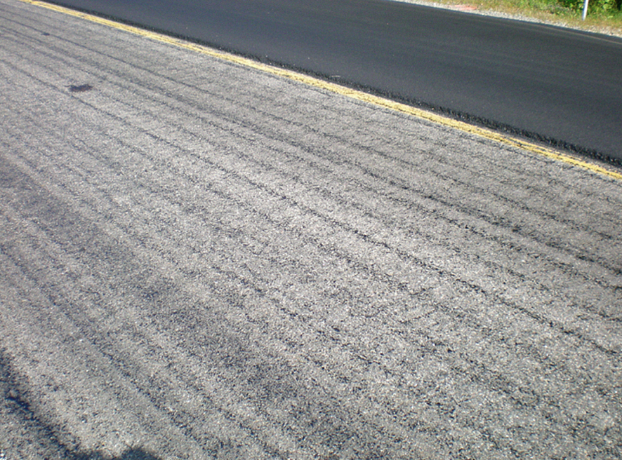 So-called ‘zebra’ tack pattern will achieve less than 50 percent available adhesion, leading to potential overlay failure. Photos courtesy Asphalt Institute.