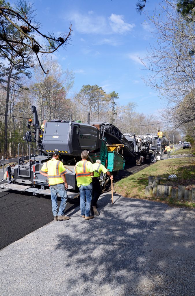 The team used oscillation compaction instead of vibration to provide minimal disturbance to the concrete slabs under the foam-recycled pavement.