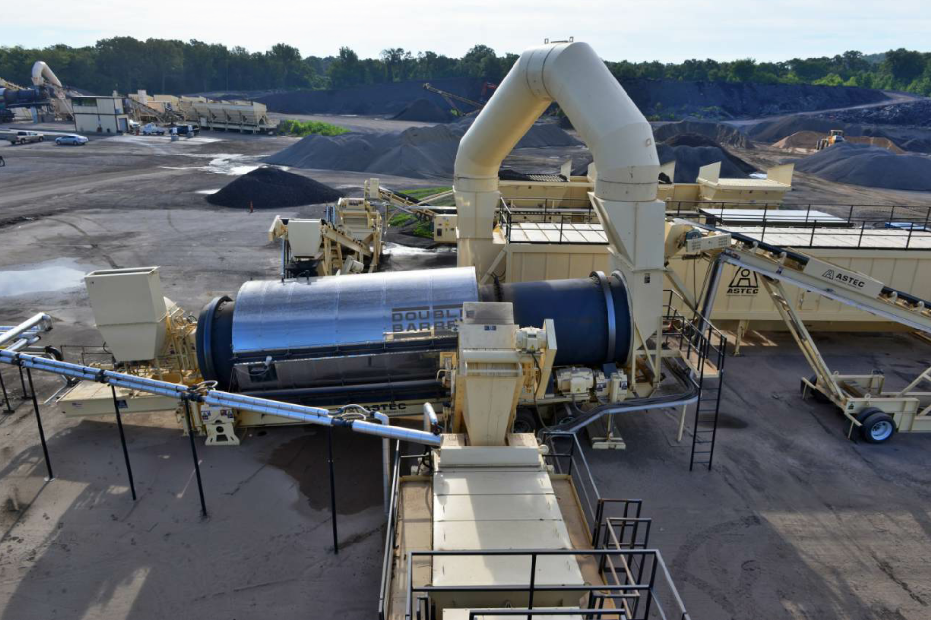 Blackstone Construction’s new plant includes the extended Double Barrel, pictured here in the foreground, to allow increased RAP percentages in mix production. All photos courtesy Astec Industries, Chattanooga, Tennessee. Caption for image saved as RAP RAS Feeds