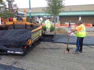 The foreman will figure where the paver will begin the project and how it will pull each pass to complete the job most efficiently.
