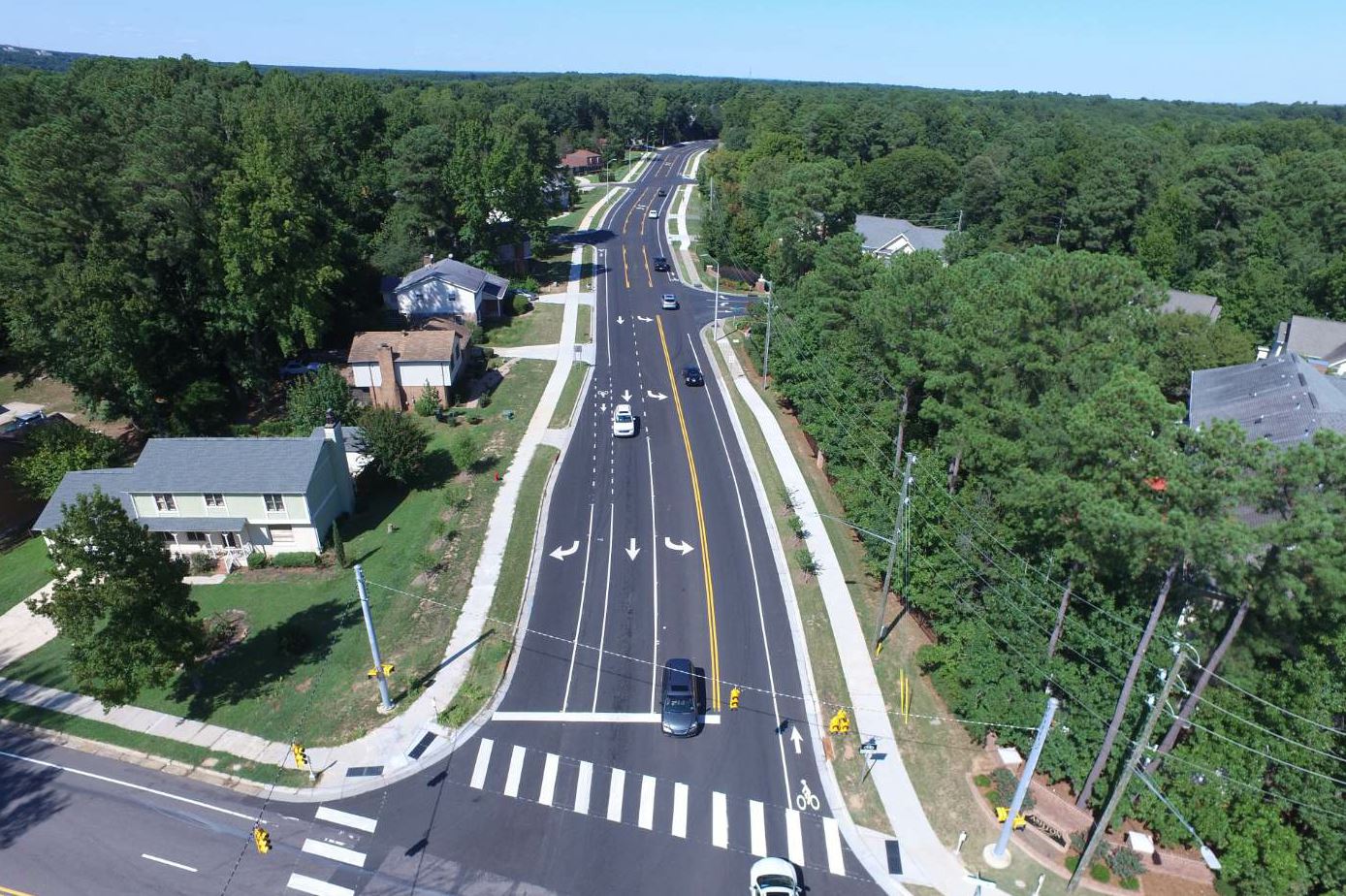 Sandy Forks Road was originally built in the 1970s as a two-lane connector road in North Raleigh. Over time, homes and businesses began to develop alongside the 1.5-mile-long corridor.