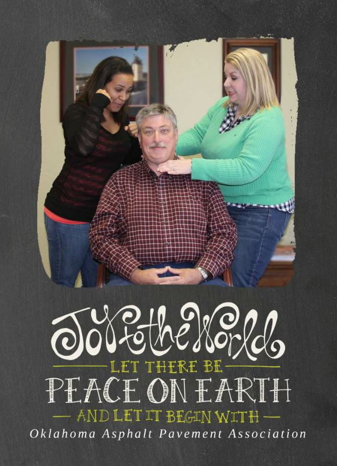 OAPA employees Chante Kizer, left, and Nicole Smith partake in some holiday ‘cheer’ with Patrick for OAPA’s holiday card.