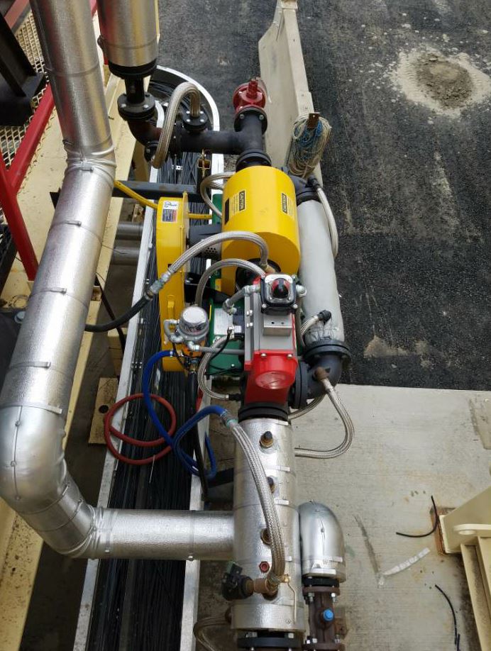 The Accu-Shear® from Stansteel/Hotmix Parts is installed in the asphalt injection line prior to the plant mixing zone.