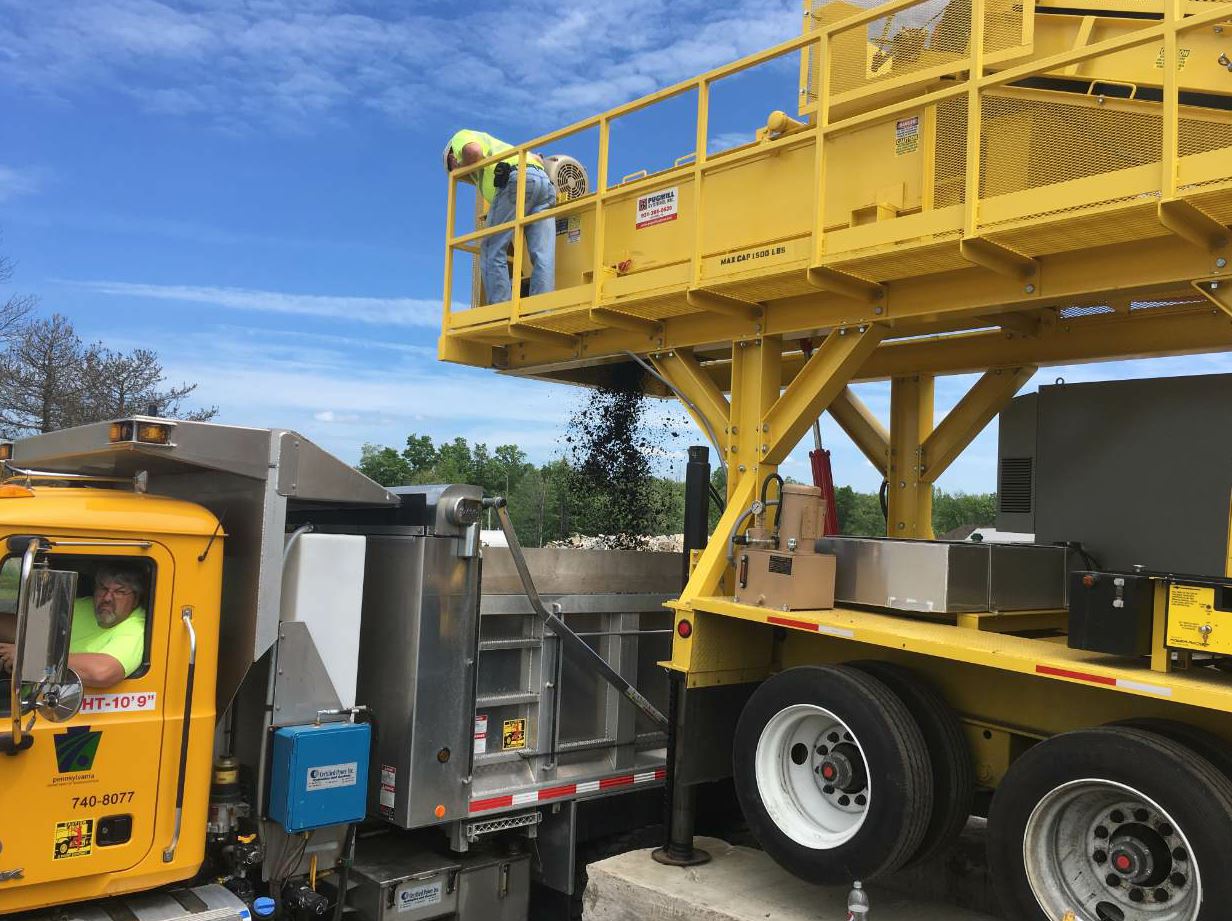 The portable pugmill plant is available in models with capacities ranging from 5 to 1,500 tons per hour. Contractors can bring crushed material to the plant where PennDOT field staff create mix with 100 percent RAP.