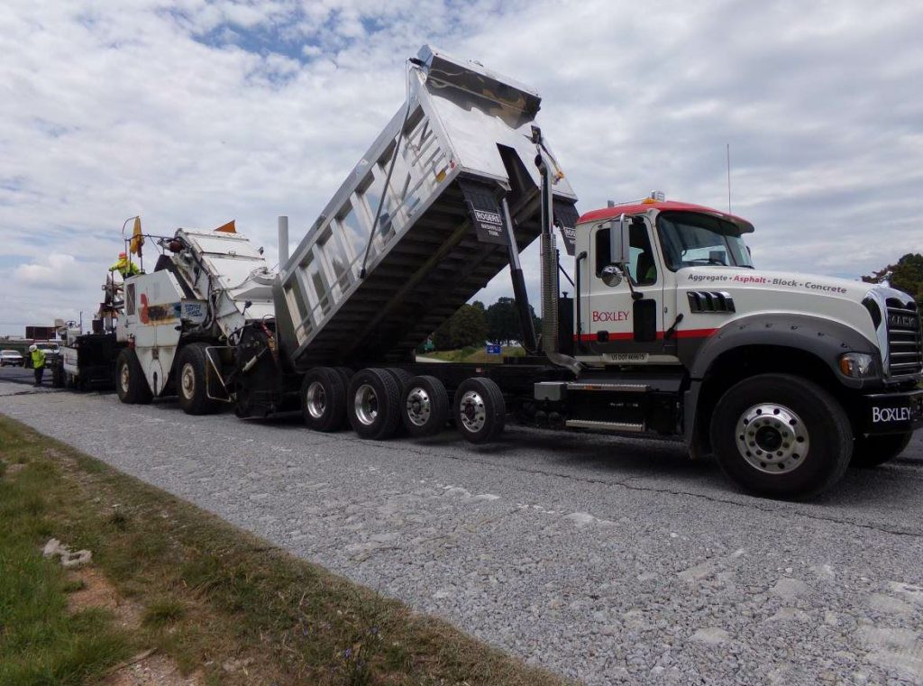 The Boxley crew utilized a Roadtec 2500A shuttle buggy to load the paver in an effort to put less weight on the paver without shifting the rubbilized surface.