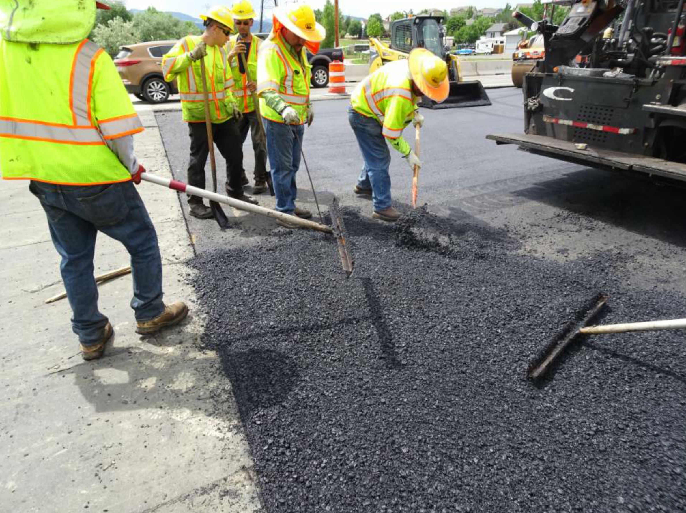 Laying asphalt pavement Stock Photo free download