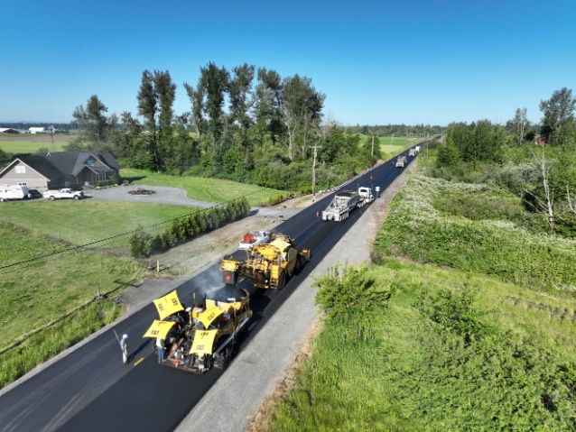 A Granite crew paves on Hampton Road in Washington.